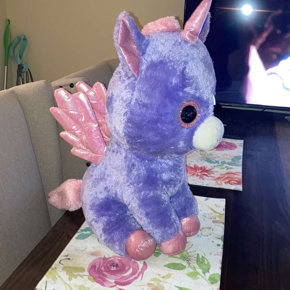 Extra large “Athena” Ty beanie baby.